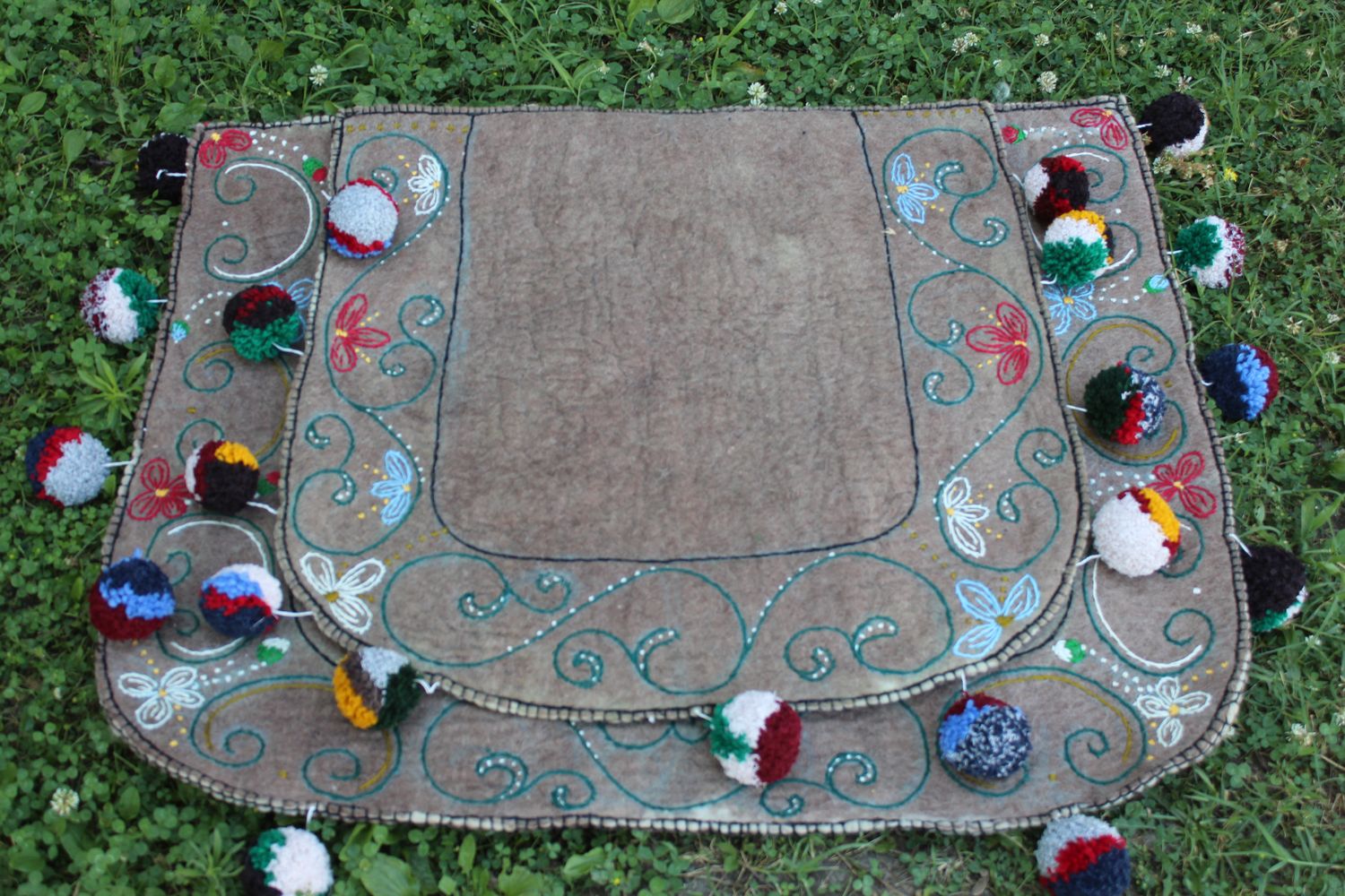 Grey felt Shabrak with fine embroidery and multicoloured pompoms